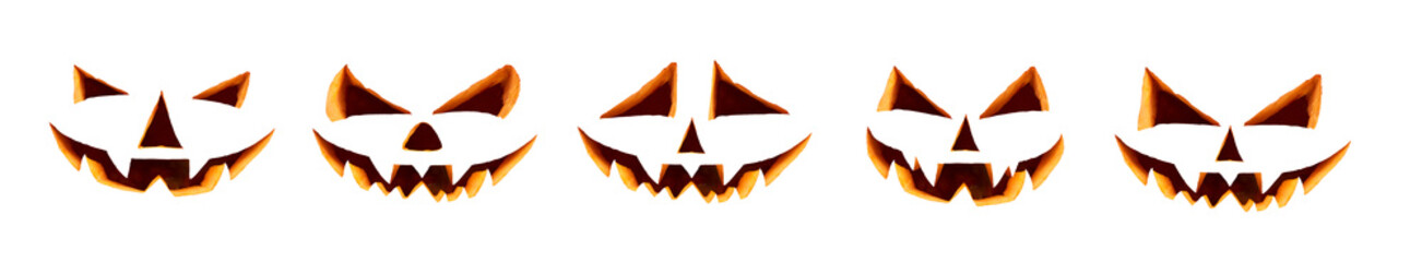 Wall Mural - five unlit halloween cut out faces isolated against a white background ready to be used on daytime p