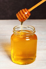 Jar of Honey with Honey Dipper