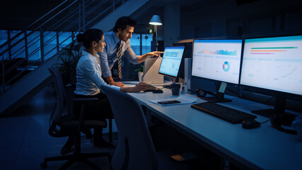 Aufkleber - Late at Night In Modern Office: Businessman and Businesswoman Work on Desktop Computer, Having Discussion, Finding Problem Solution, Finishing Project. Successful Dedicated Responsible Office Workers