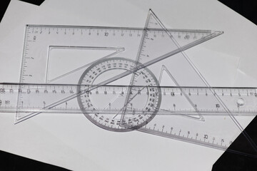 various rulers on white paper