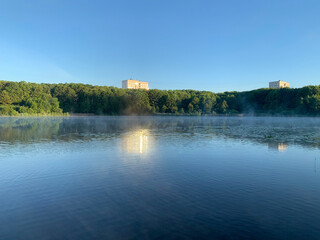 Small fog over  Pekhorka river in July morning. Balashikha, Moscow region, Russia