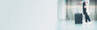 © tickcharoen04 - web banner solo woman journey activity with luggage concept from hipster woman wait elevator for check in to hotel