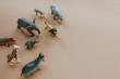 plastic toy figures of animals. concept of nature protection. space for text, top view.