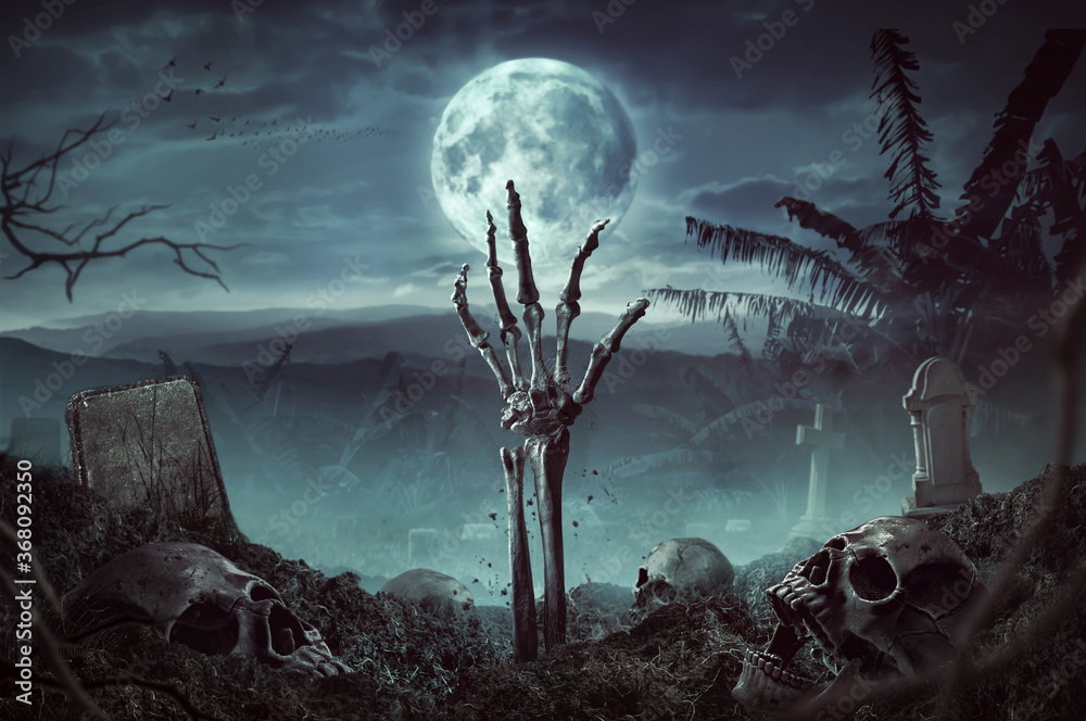 Zombie skeleton hand rising in dark Halloween night. - obrazy, fototapety, plakaty 