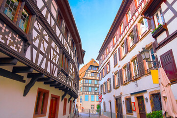 Urban view of traditional half-timbered houses on canals in district little France in the medieval town of Strasbourg, Alsace, France.