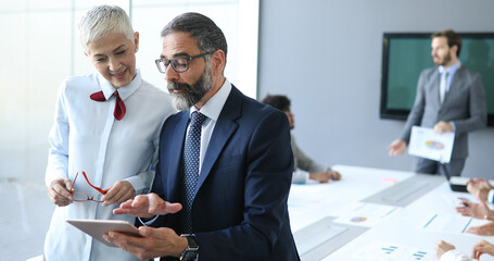 Business coworkers discussing new ideas and brainstorming in a modern office