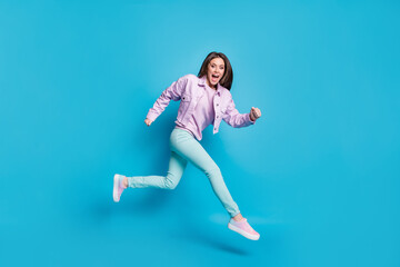 Sticker - Full length body size view of her she nice attractive pretty energetic motivated cheerful girl jumping running motion movement isolated on bright vivid shine vibrant blue color background