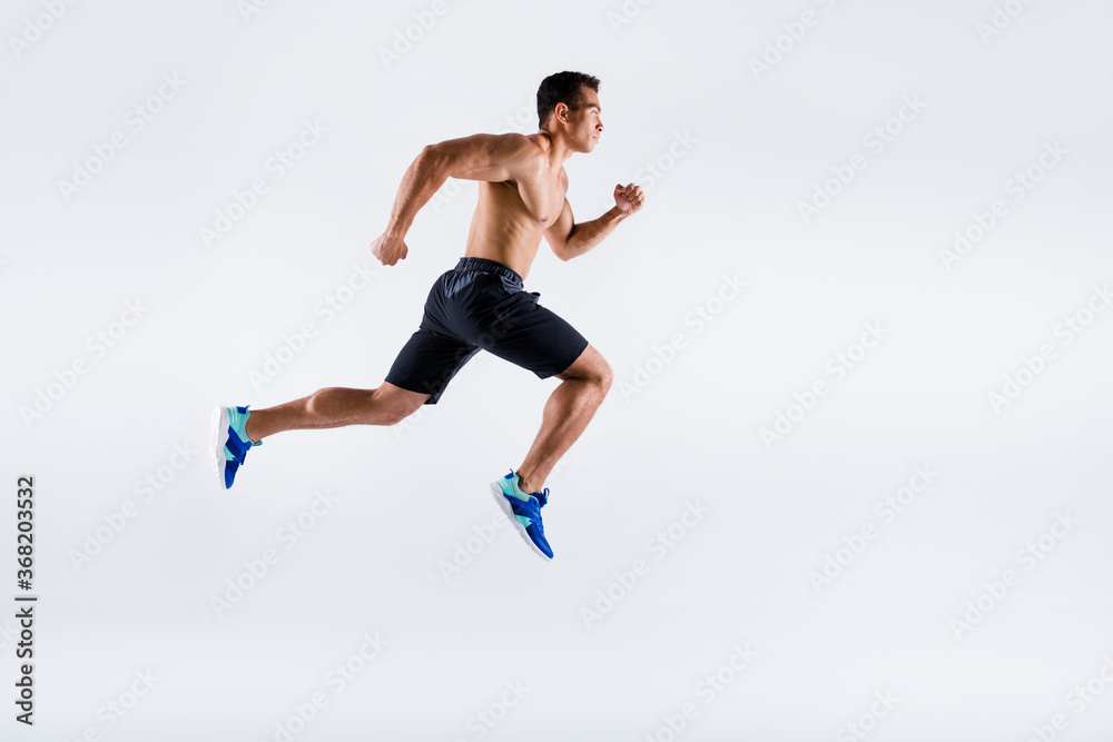 Full length body size view of his he nice attractive powerful professional sportive focused purposeful guy jumping running motivation isolated over light white pastel color background - obrazy, fototapety, plakaty 