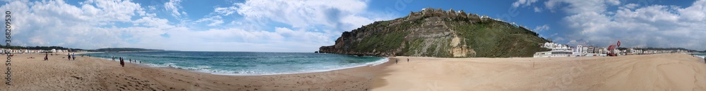 Panorama of Nazaré with the beach, houses and the Atlantic ocean   - obrazy, fototapety, plakaty 
