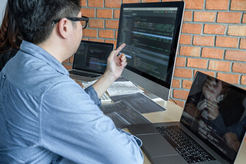 Leinwandbilder - Programmers at Developing programming and website working in a software