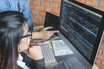 Leinwandbilder - Programmers at Developing programming and website working in a software