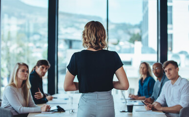 female business leader conducting a meeting