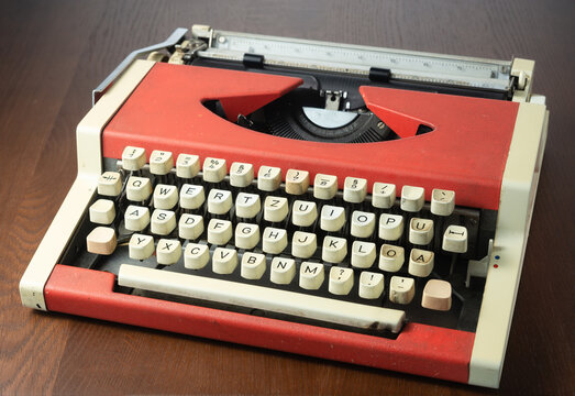 Red typewriter on the table