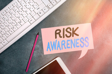 Sticker - Handwriting text writing Risk Awareness. Conceptual photo recognizing factors that may cause a lifethreatening effect Paper accesories with digital smartphone arranged on different background