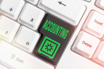Poster - Text sign showing Accounting. Business photo showcasing system of summarizing business and financial transactions Different colored keyboard key with accessories arranged on empty copy space