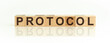 protocol word made with building blocks on a light background