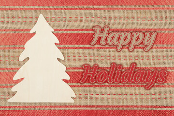 Wall Mural - Happy Holidays type greeting with wood Christmas tree