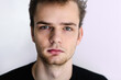 © polya_olya - Portrait, face of a teenager, a young guy close-up, isolated on a light background