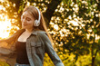 © Drobot Dean - Beautiful young woman listening to music with headphones