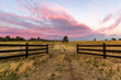 © Justin Mckinney/Austockphoto - Country Farm Gates with colourful sky