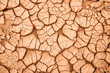 © Rosalie Dibben/Austockphoto - Cracks in dried mud