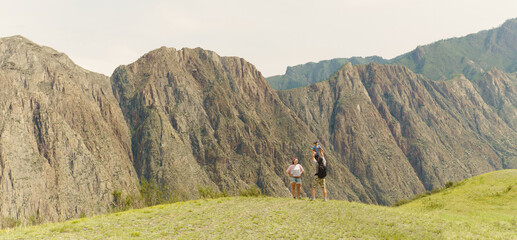 Wall Mural - Happy family having fun in the mountains.