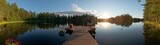 Fototapeta Przestrzenne - Sun is setting on Finnish lake (panorama)