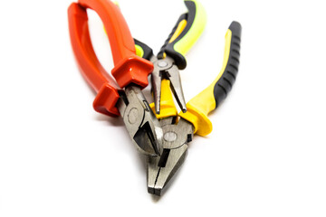 Wall Mural - work tool. Red pliers side cutters close up isolated white background