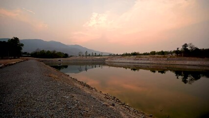 Poster - 4K Timelapse Video of Reservoir at Sunset, Chiang Mai Province.