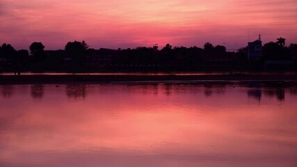 Poster - 4K Timelapse video of Ping river at sunset, Kamphaeng Phet province.