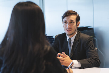 Wall Mural - HR manager interviewing female candidate applicant who recruit job in the office.