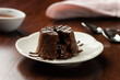 © zequinao - chocolate petit gateau and cocoa with hot melted inside