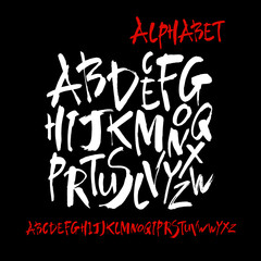 Wall Mural - vector acrylic brush style hand drawn alphabet font. calligraphy alphabet on a black background