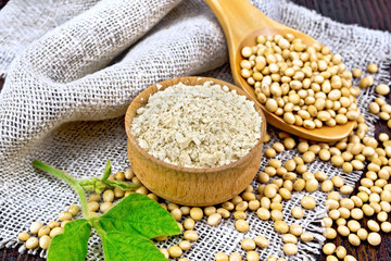 Poster - Flour soy in bowl with spoon on sacking