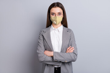 Wall Mural - Portrait of her she attractive classy content smart clever businesslady wearing safety n95 reusable mask mers cov prevention respiratory disease sickness illness isolated grey color background