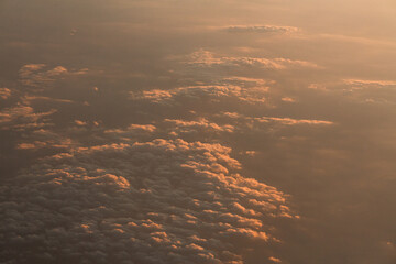 Wall Mural - Clouds scape at sunset from above