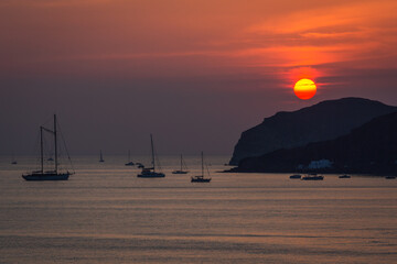 Wall Mural - sunset with yahts on Santorini  island Greece