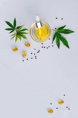 Wall Mural - CBD oil, tincture with a pipette on a white background with hemp leaves. Concept medical cannabis Trendy Flat Lay Minimalism