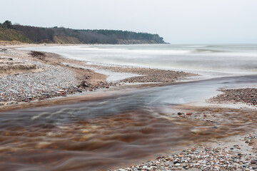 Wall Mural - Sea coast on a sunny day with stone