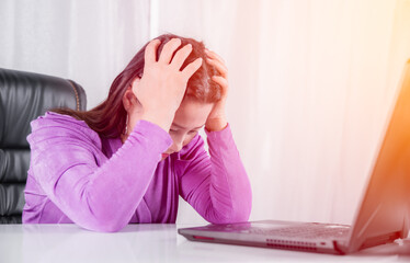 Asian businesswoman sitting headache with failure and stressed from work in office