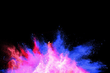 Wall Mural - Explosion of colored powder isolated on black background. 