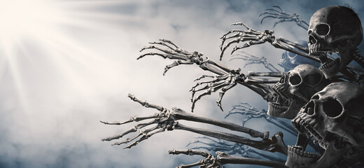 zombie skeleton hand rising in dark halloween night.