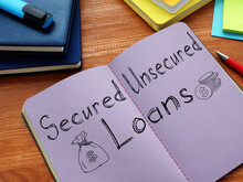 Secured Vs Unsecured Loans Is Shown On The Conceptual Business Photo
