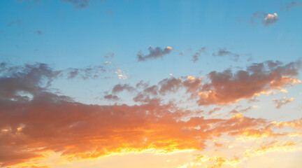 Wall Mural - beautiful colorful sunset sky with orange clouds. nature sky background.