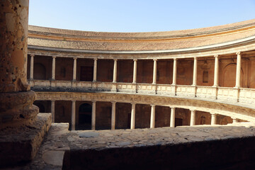 round palace inside Alhambra of Granada with columns - interior postcard from above