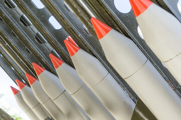 Wall Mural - Combat missiles in a row, warhead, projectile. Weapons of mass destruction, nuclear chemical