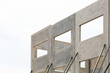 © Milbsie - building under construction with concrete panels supported by props