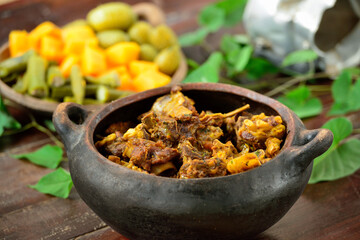 Brazilian gastronomy. Goat meat in the clay pot.