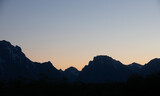 Fototapeta Perspektywa 3d - Sunset Panoramic view of Grand Tetons in Wyoming, USA