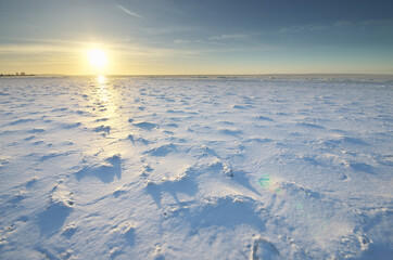 Wall Mural - Winter landscape. Ice on water surface.